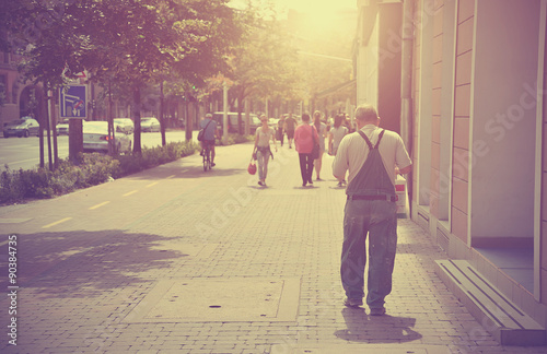People walking in the street. Vintage photo © SasaStock
