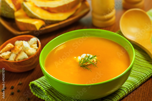 Pumpkin Soup with croutons on table