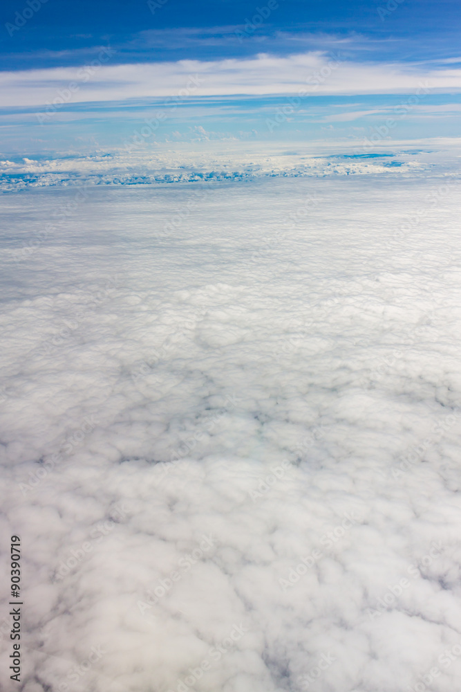 White fluffy clouds in the blue sky