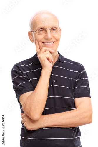 Senior gentleman smiling and looking at the camera