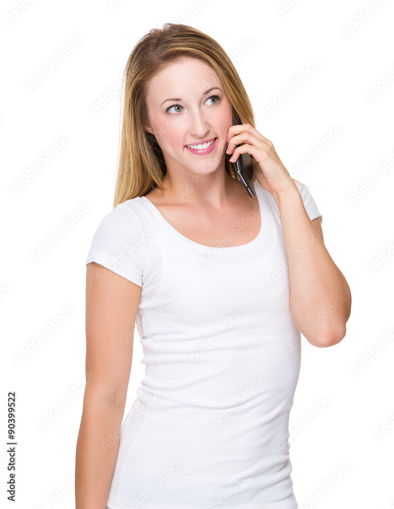 Caucasian young woman talk to mobile phone Caucasian young woman talk to mobile phone