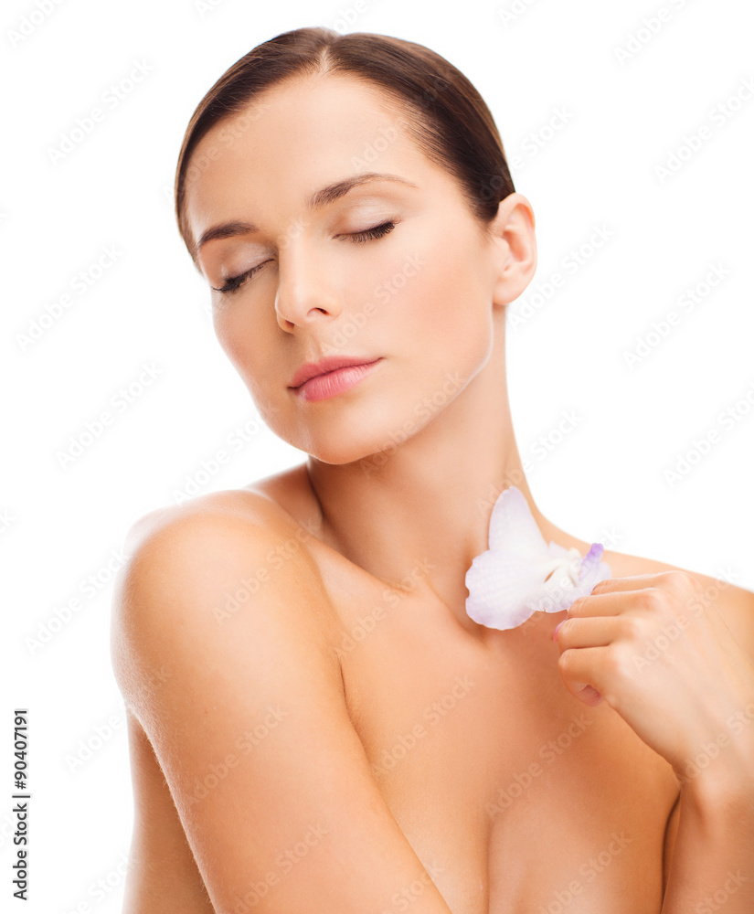 relaxed woman with orchid flower relaxed woman with orchid flower