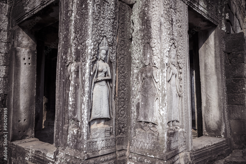 Apsara carvings status on the wall of Angkor temple, world herit