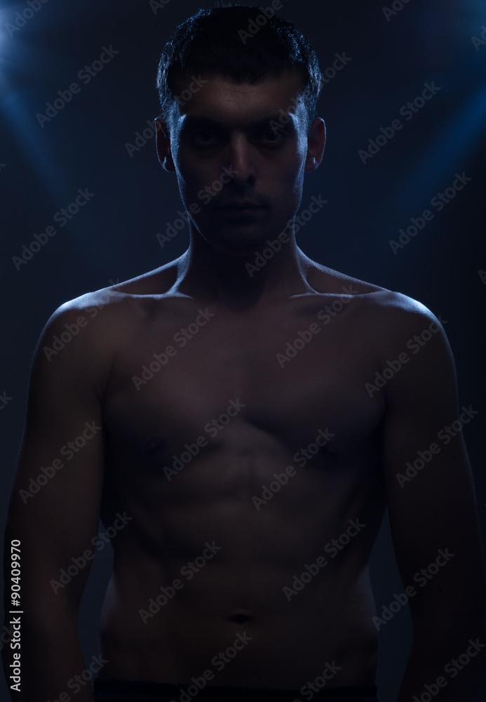 young man on a dark blue background