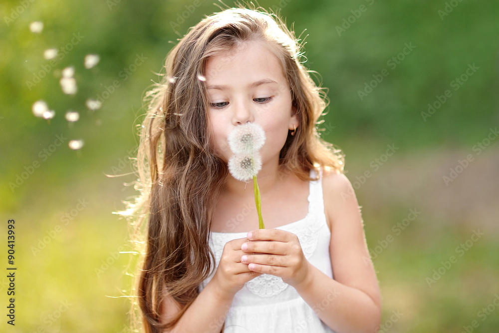 portrait of a beautiful little girl with flowers portrait of a beautiful little girl with flowers