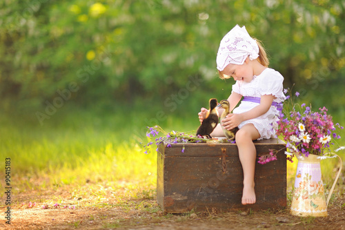 portrait of little girl outdoors in summer © zagorodnaya