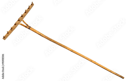 Tableau sur toile Garden rake isolated on white.  Vintage Retro Wooden Rake