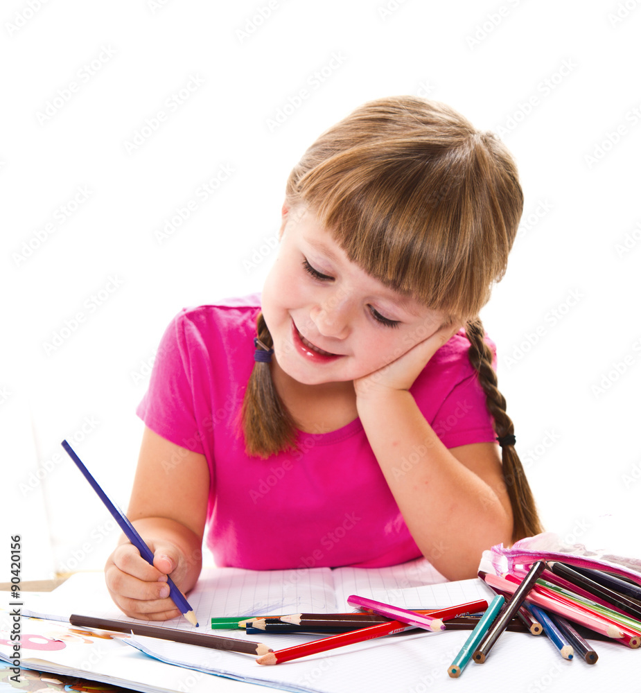 lovely little girl writing at the desk lovely little girl writing at the desk