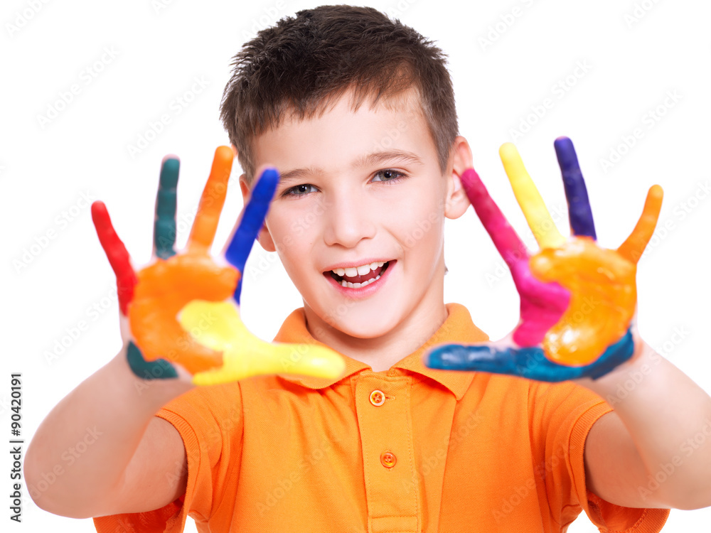 Happy smiling boy with a painted hands. Happy smiling boy with a painted hands.