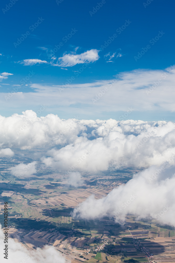 aerial view of  the  landscape over the clouds