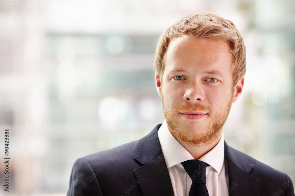 Head and shoulders portrait of a young businessman Head and shoulders portrait of a young businessman