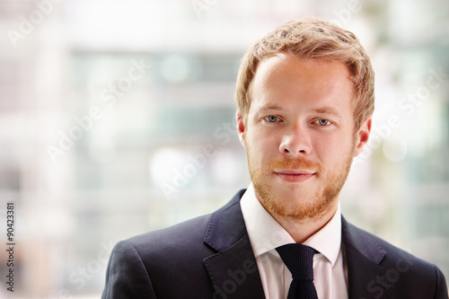 Head and shoulders portrait of a young businessman