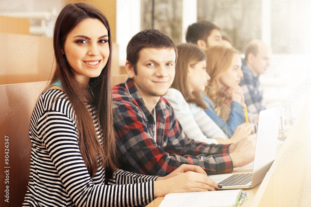 Fototapeta premium Group of students sitting in classroom