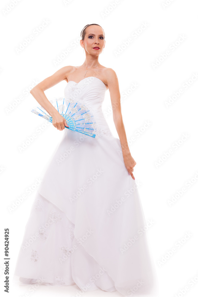 Full length bride in wedding gown holds fan isolated Full length bride in wedding gown holds fan isolated