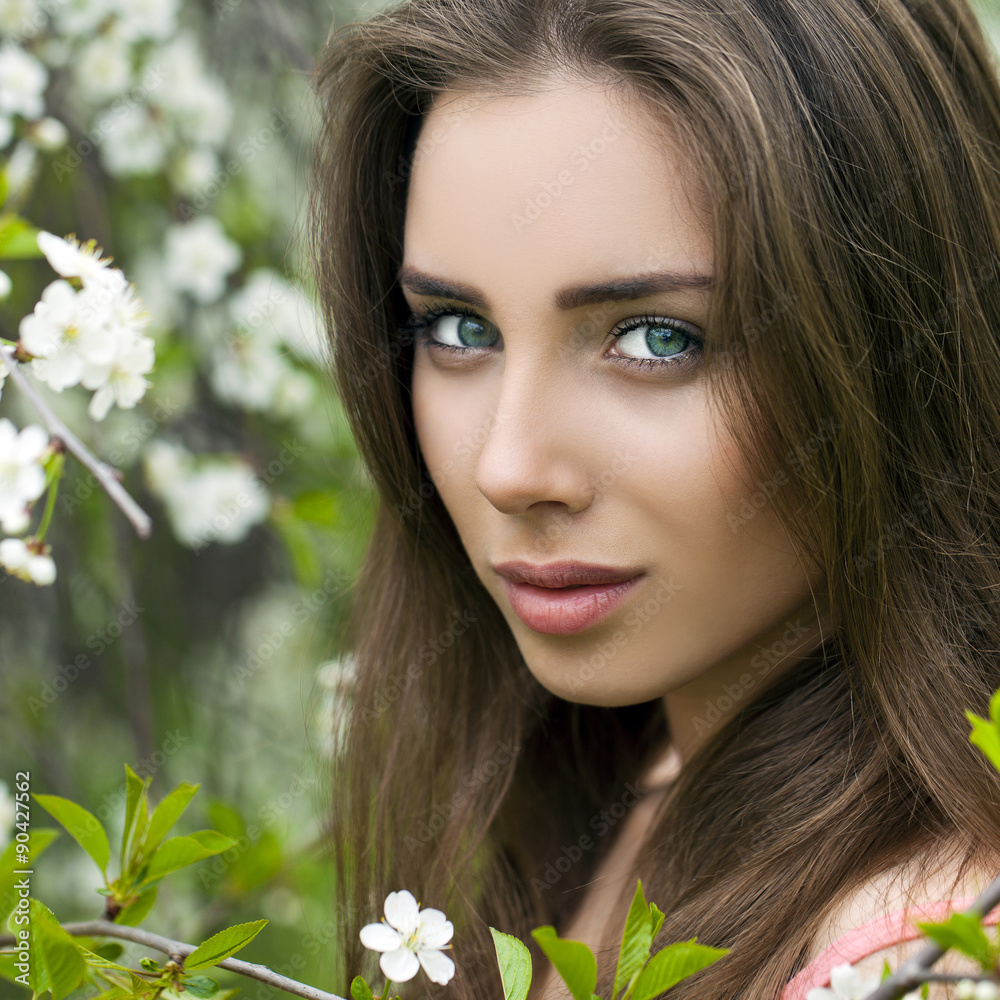 Close up portrait of a beautiful young girl on the background of Close up portrait of a beautiful young girl on the background of