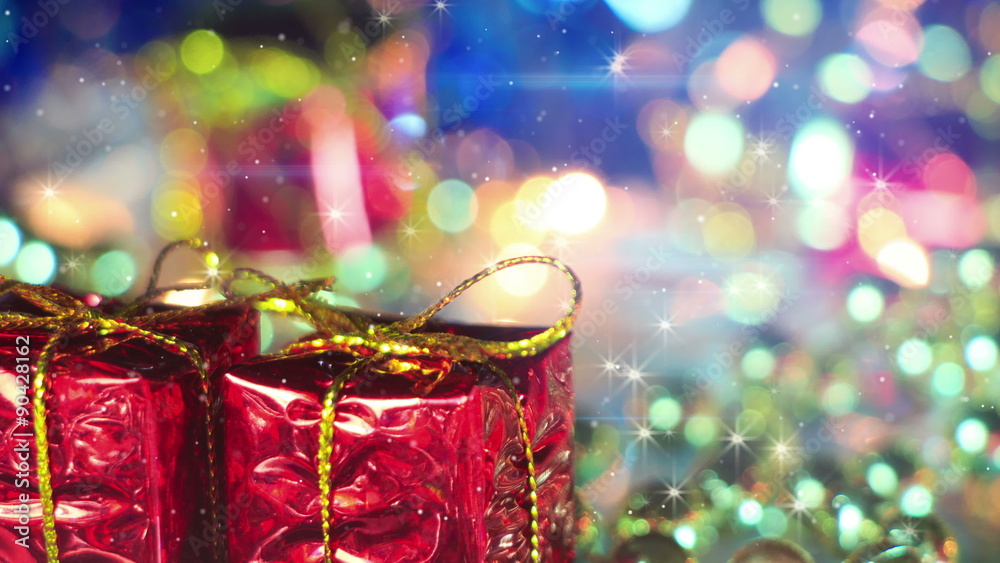 Christmas gift boxes and shimmering particles loopable