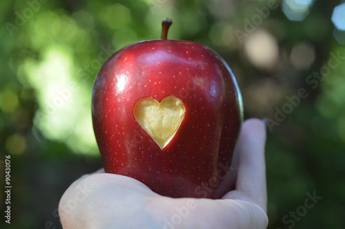 Red apple with heart