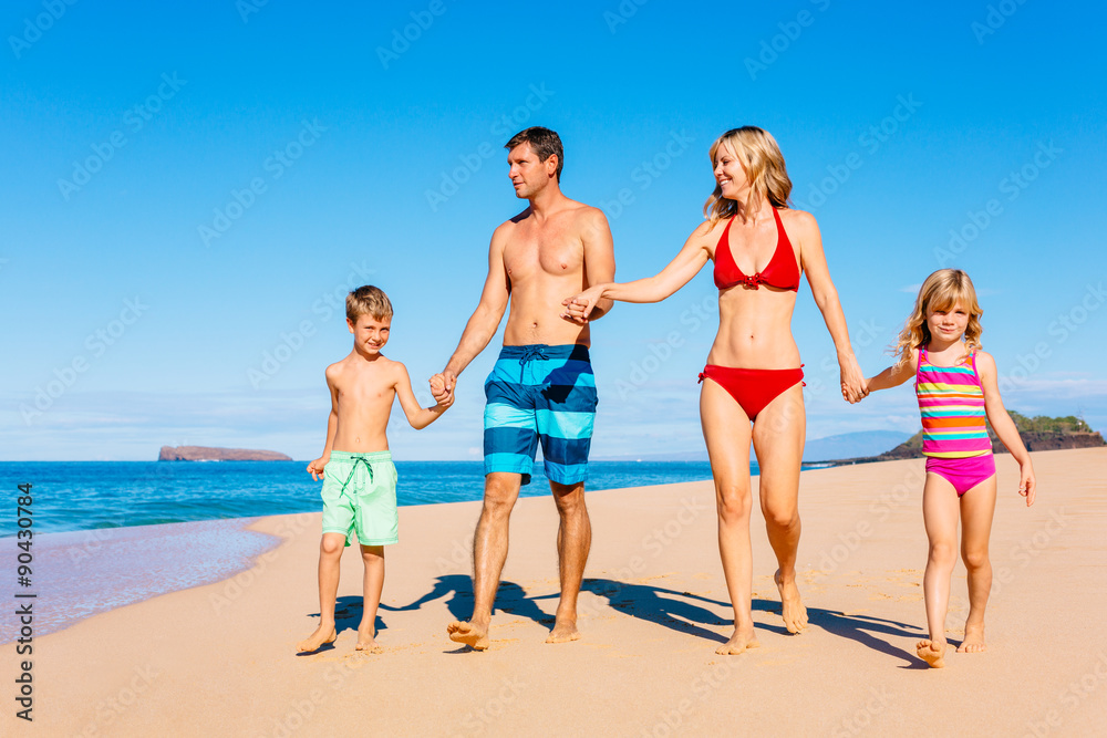 Happy Family Having Fun on the Beach