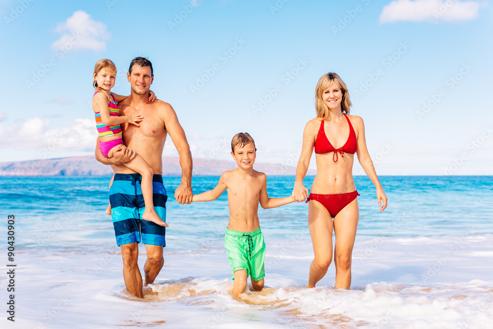 Happy Family Having Fun on the Beach