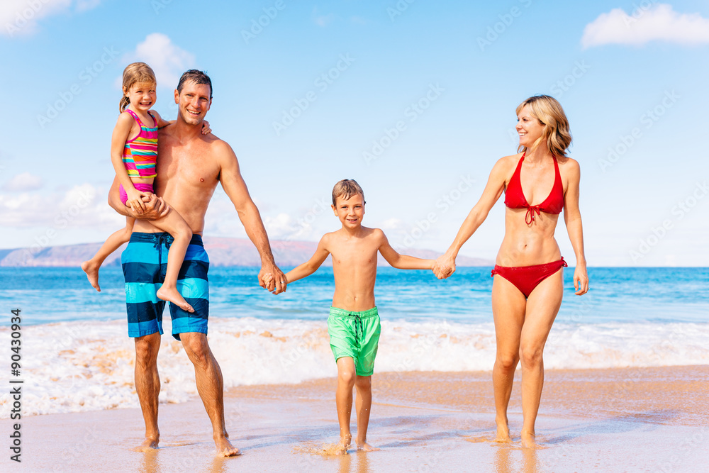 Happy Family Having Fun on the Beach