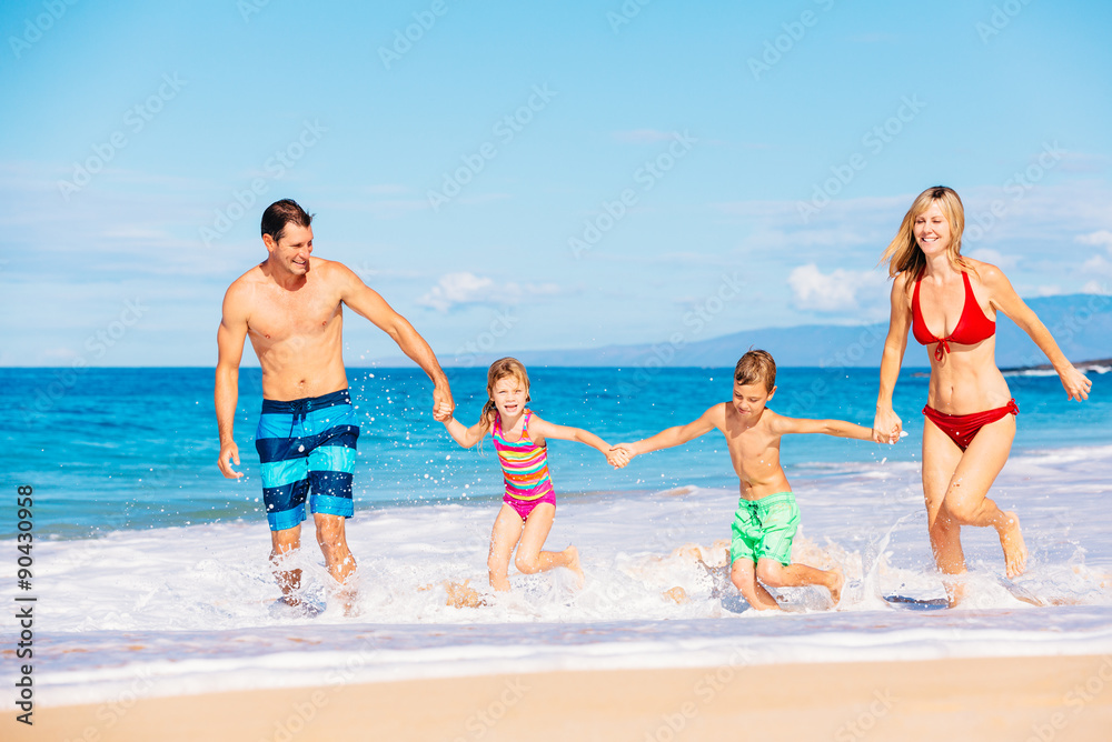Happy Family Having Fun on the Beach