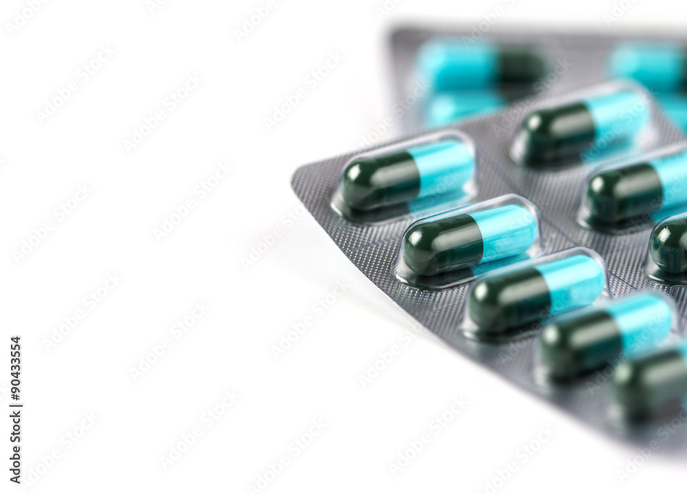 selective focus of close up blue medicine capsule selective focus of close up blue medicine capsule