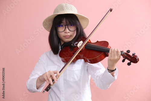 Asian teen with violin glasses hat smile