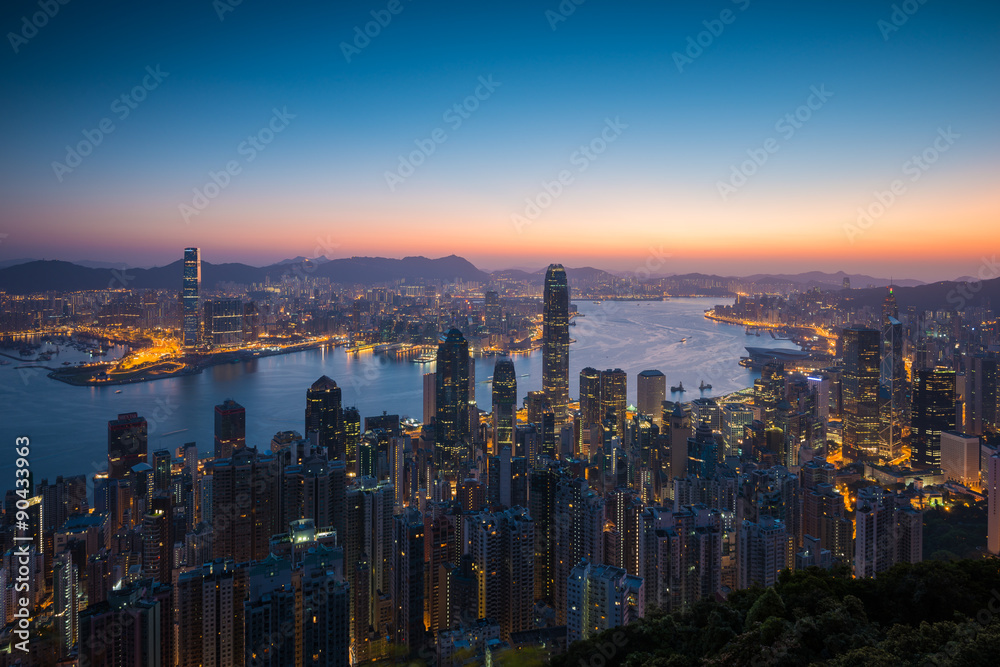 Fototapeta premium Sunrise cityscape on the peak in Hong Kong Island.