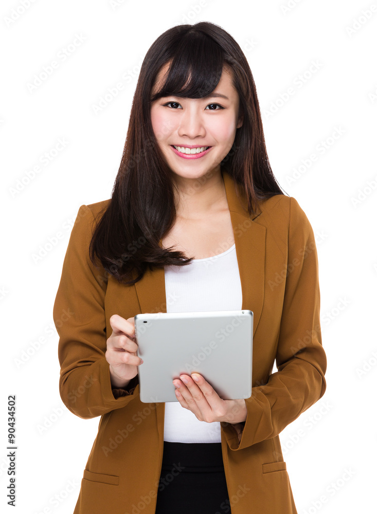 Young businesswoman use of the digital tablet Young businesswoman use of the digital tablet