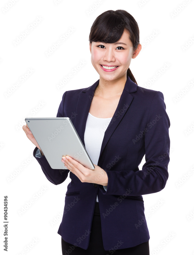 Young businesswoman use of the digital tablet pc Young businesswoman use of the digital tablet pc