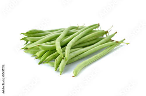 stack of fresh needle beans on white background