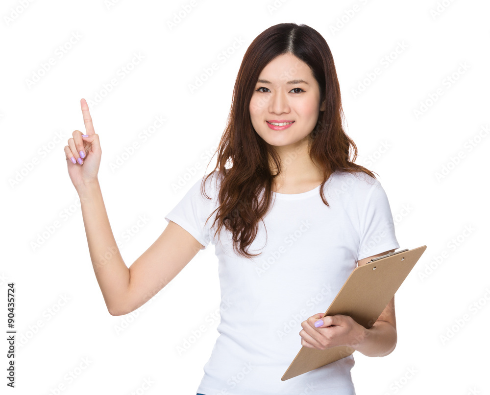 Young woman hold with clipboard and finger point up Young woman hold with clipboard and finger point up