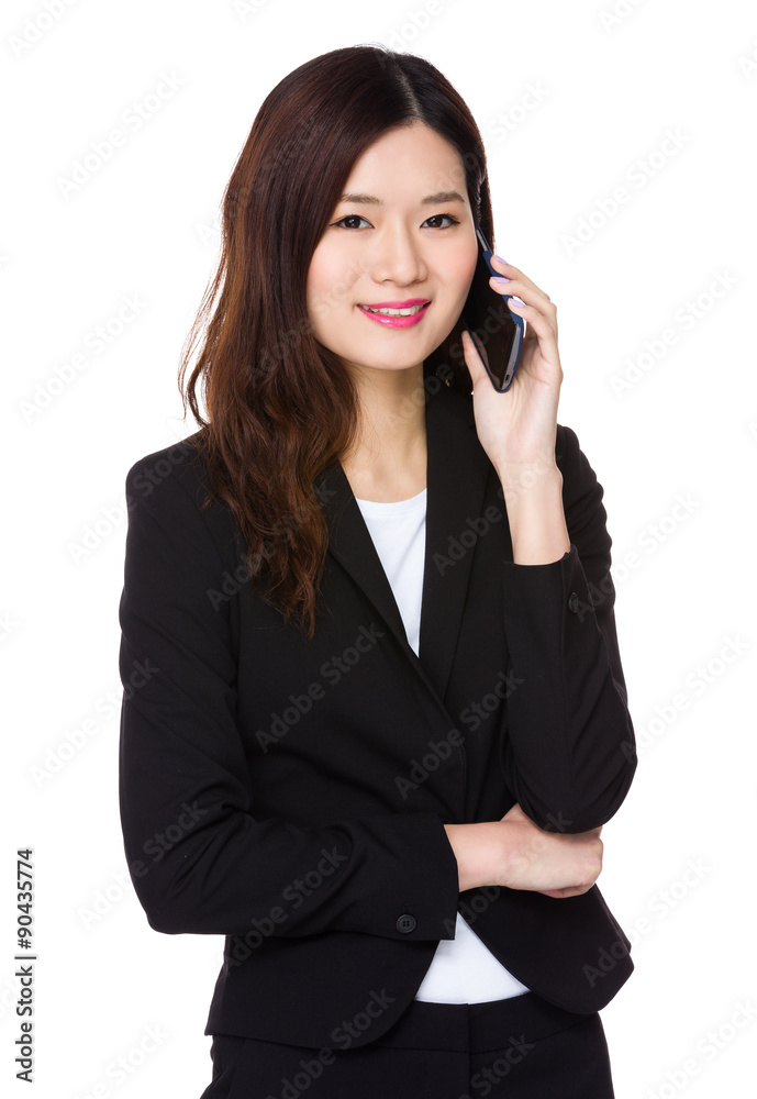 Asian Young businesswoman talk to cellphone Asian Young businesswoman talk to cellphone