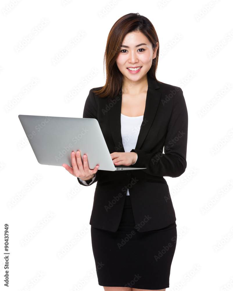 Asian businesswoman use of the laptop computer Asian businesswoman use of the laptop computer