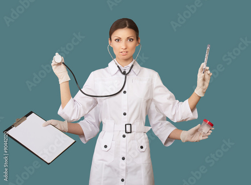 Bilde på lerret Portrait of a nurse with many hands, concept