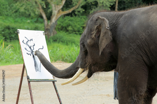An elephant is painting a picture 
