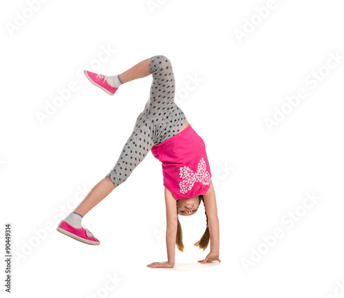 little girl turning handsprings photo