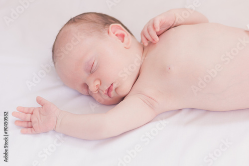 Sleeping newborn baby boy