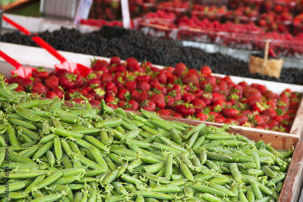 Marketplace with garden truck, vegetables, fruits, berries etc. in Helsinki, Finland