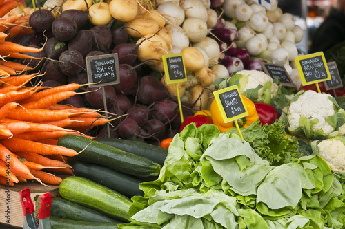 Marketplace with garden truck, vegetables, fruits, berries etc. in Helsinki, Finland