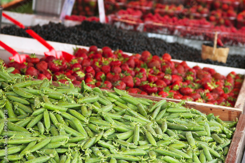 Marketplace with garden truck, vegetables, fruits, berries etc. in Helsinki, Finland
