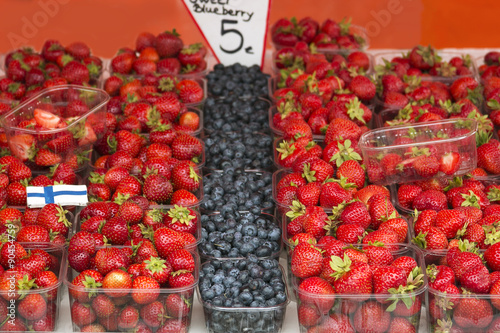 Marketplace with garden truck, vegetables, fruits, berries etc. in Helsinki, Finland
