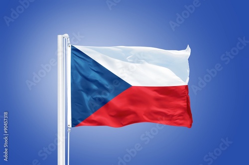 Flag of Czech Republic flying against a blue sky