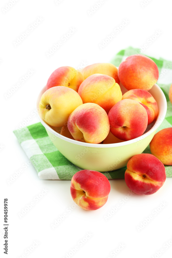 Fresh apricots in bowl on a white background Fresh apricots in bowl on a white background