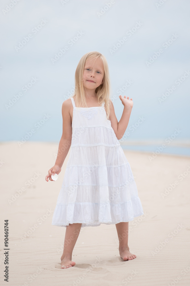 Beautiful young girl on the beach Beautiful young girl on the beach