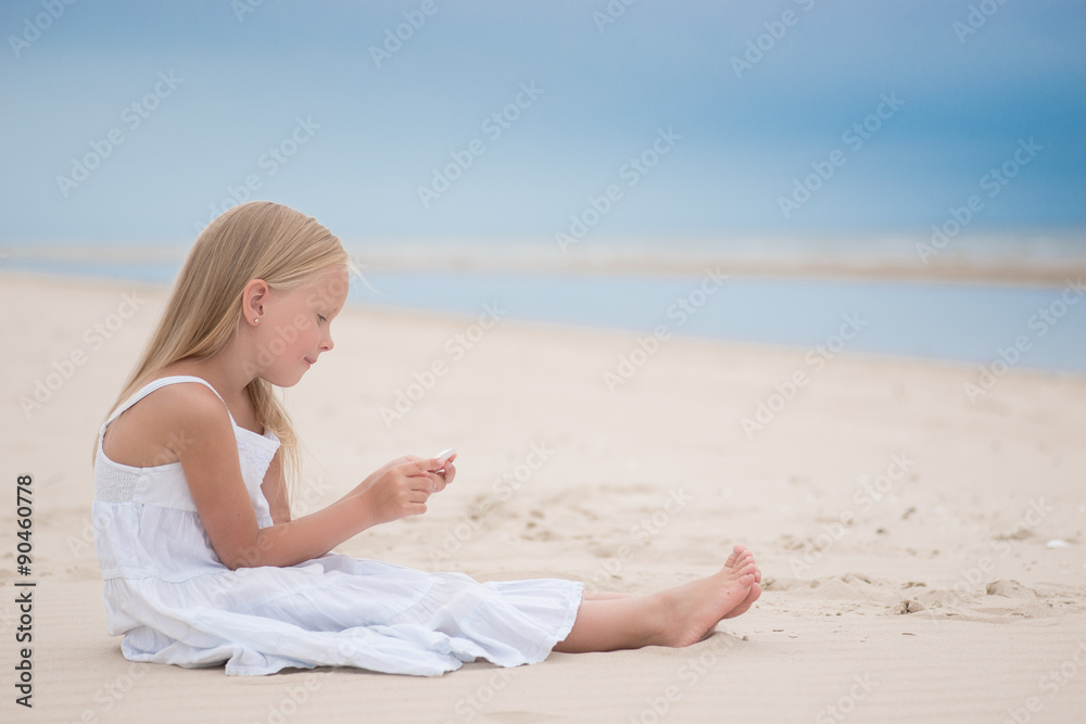 Beautiful young girl on the beach