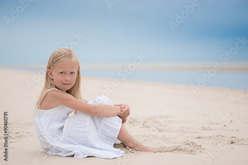 Beautiful young girl on the beach