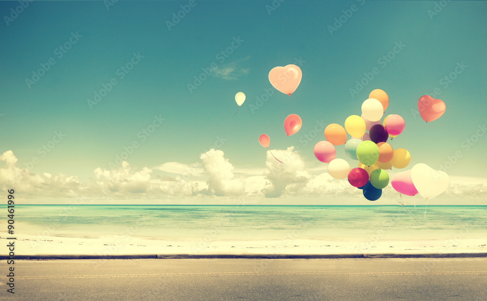 Vintage Car with heart balloon on beach blue sky concept of love in summer and wedding honeymoon