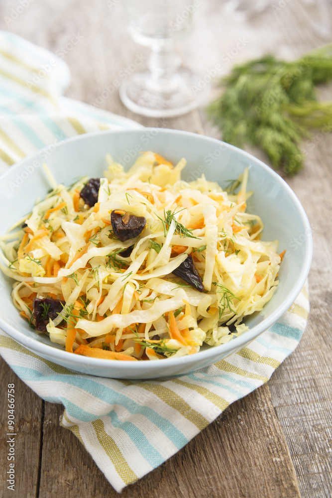 Cabbage with carrot, herbs and prunes