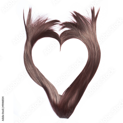Heart shape from beautiful brown hair, isolated on white background